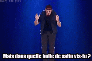 a man is dancing on a stage with the words mais dans quelle bulle de satin vis-tu written above him