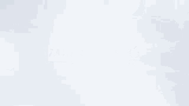 a blurred image of a person 's face with the words di nte in red