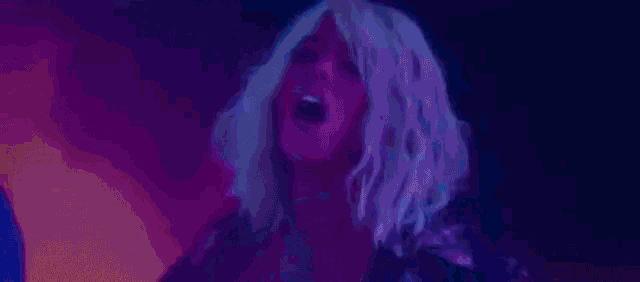 a close up of a woman 's face with the word tony written on it .