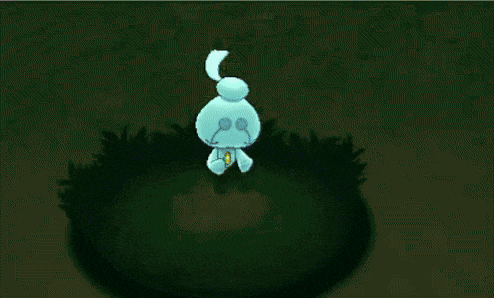 a blue rabbit is surrounded by a yellow circle of light