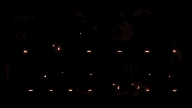 the letters l and l are lit up in a dark room