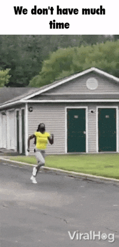 a man in a yellow shirt is running in front of a house that says we don t have much time