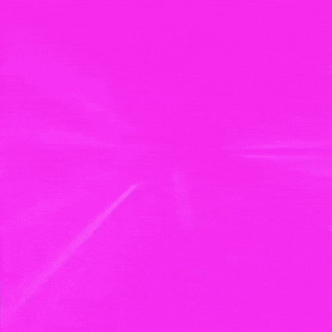 a pink and purple logo is surrounded by purple and blue lights on a dark background .