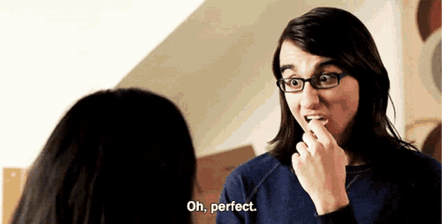 a man wearing glasses says oh perfect