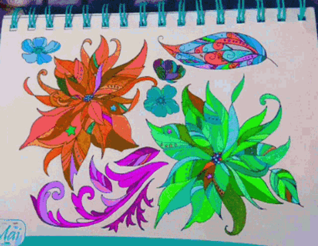a colorful drawing of flowers and leaves on a spiral bound notebook