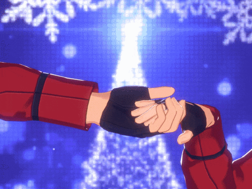 a man and woman holding hands in front of a christmas tree