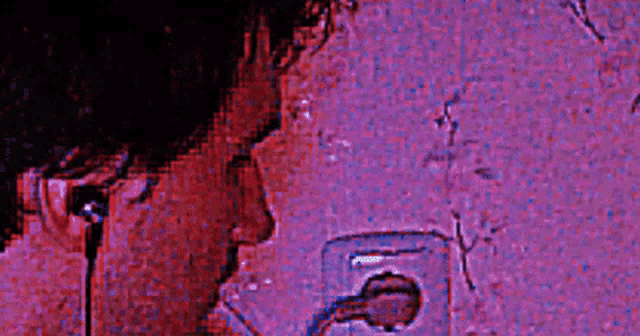 a close up of a man smoking a cigarette