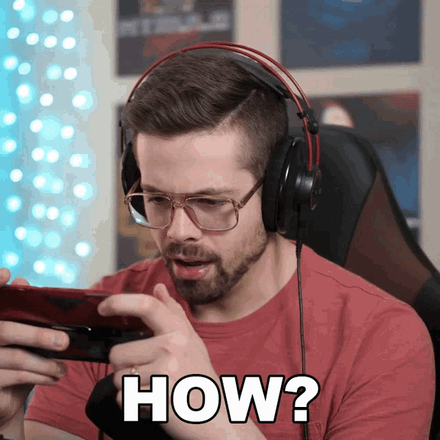 a man wearing headphones is playing a game and says how