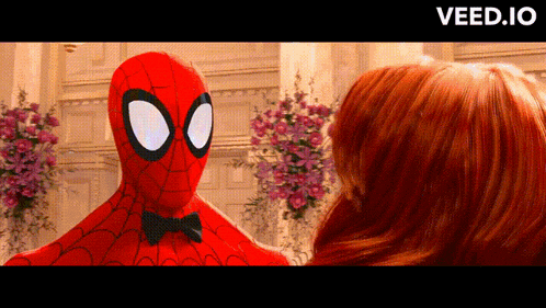 a spider man in a bow tie looks at a woman