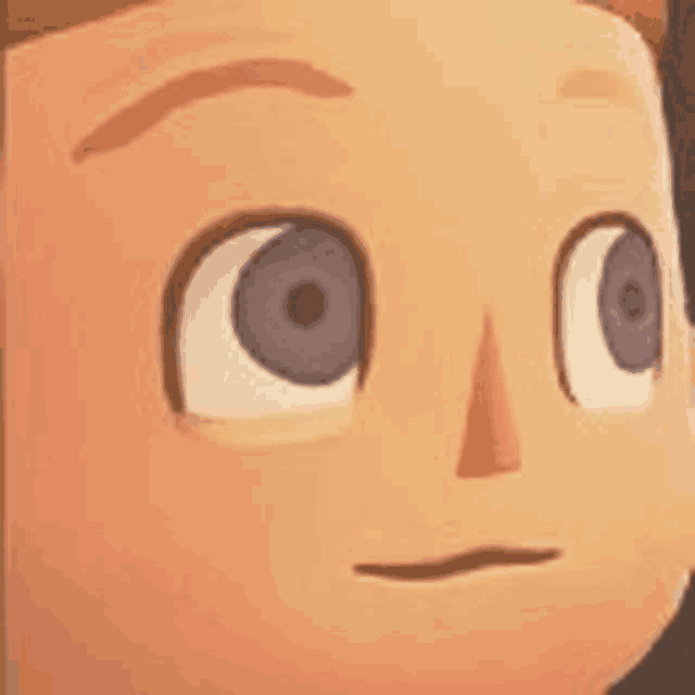 a close up of a cartoon character 's face with a serious look on his face .