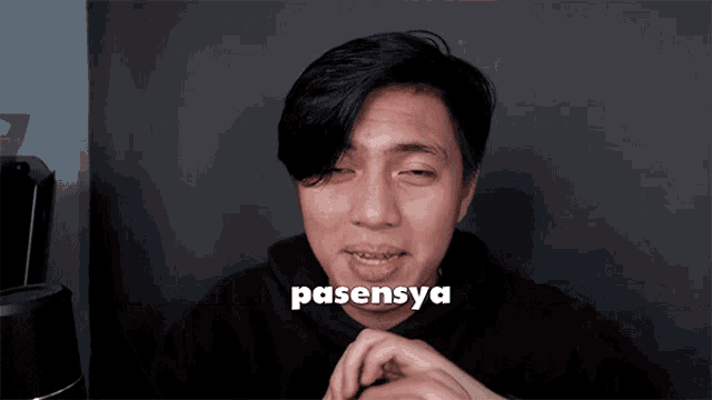 a man with his eyes closed has the word pasensya on his face