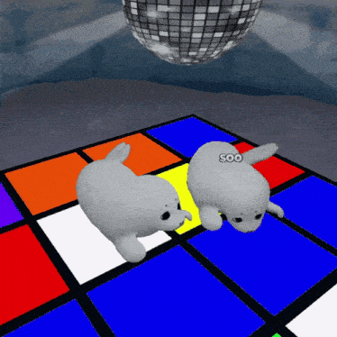 two seals are dancing on a colorful dance floor with a disco ball above them