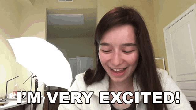 a woman says i 'm very excited in a room