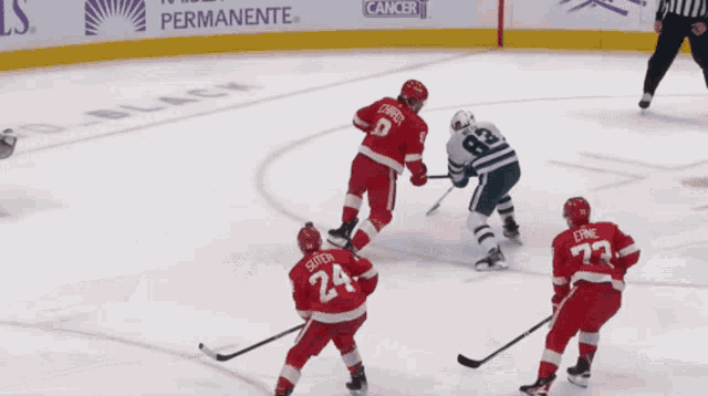 a hockey game is sponsored by jack daniels and kaiser permanente