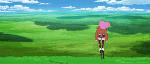 a girl with pink hair is walking through a field