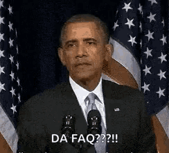barack obama is giving a speech in front of a microphone and says da faq ?