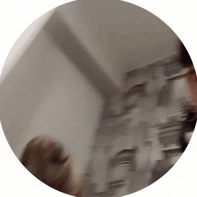 a blurry picture of a person standing in a room
