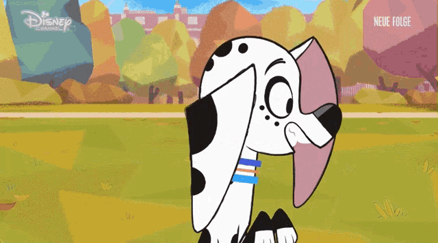 a cartoon dalmatian is laughing with a disney channel logo in the background