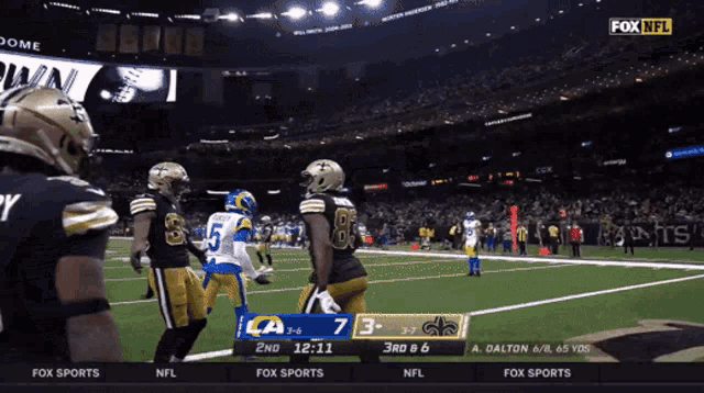 fox sports is showing a football game between the saints and rams