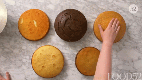 Checking Cakes Food52 GIF - Checking Cakes Food52 Touching Cakes GIFs