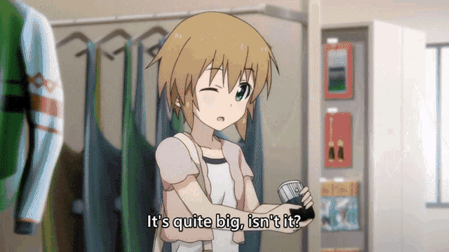 a girl in a dressing room with the words it 's quite big isn 't it