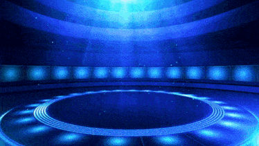 a blue room with a circle of lights surrounding it