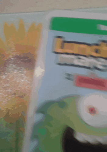 a lunch mate box has a monster on the front
