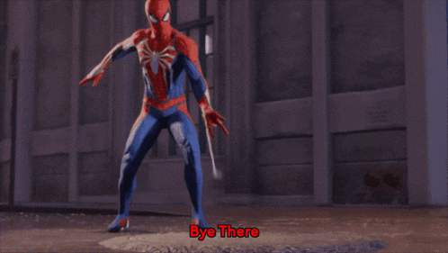 a spider man says bye there while standing in a room