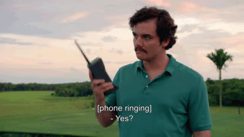 Answering The Phone GIF - Narcos Yes Who Is It Hello GIFs
