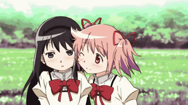a couple of anime girls standing next to each other in a field