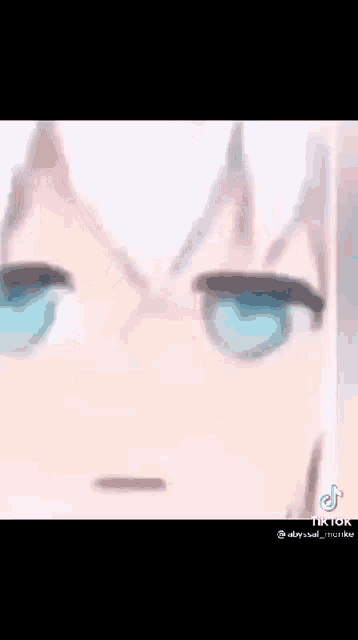 a close up of a anime girl 's face with blue eyes .