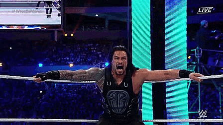 a wrestler with his arms outstretched and the word live on the bottom right