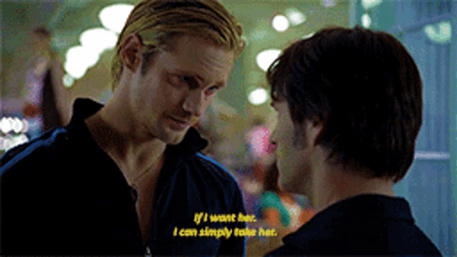 two men are looking at each other and one of them is saying if i want her i can simply take her