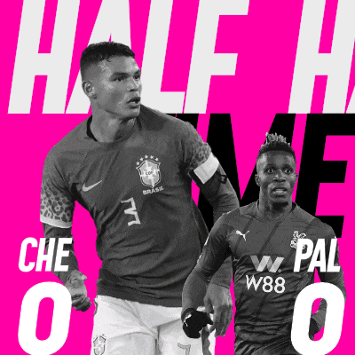 a black and white photo of two soccer players with the words half time on the bottom