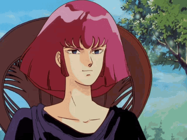 a woman with pink hair is sitting in a chair with a tree in the background