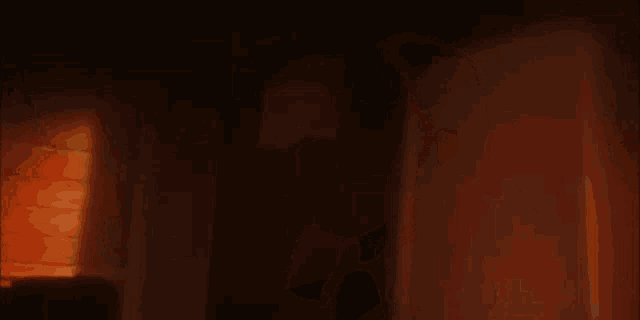 a silhouette of a woman with glowing eyes is standing in an open doorway