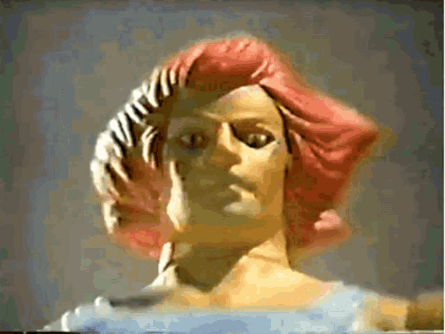 a statue of a woman with pink hair and a blue dress