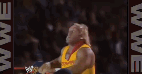 hulk hogan is wearing a yellow tank top that says ultimate warrior