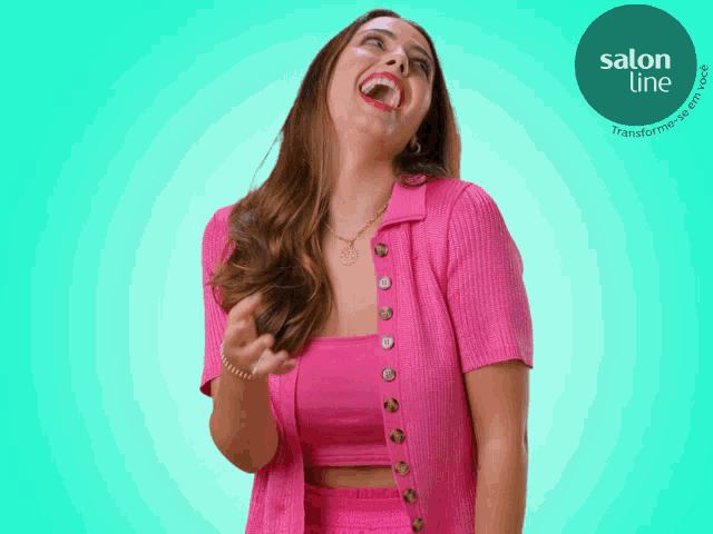 a woman in a pink shirt is laughing in front of a blue background with a salon line logo