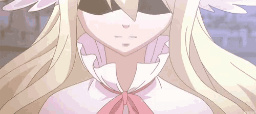 a close up of a blonde anime girl wearing a pink bow tie and a mask .