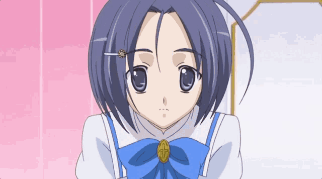 a girl with blue hair and a blue bow has a cross on her hair clip