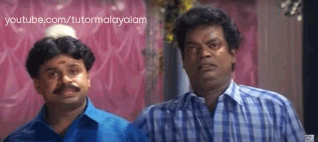 two men standing next to each other with youtube.com/tutormalayalam written on the bottom right