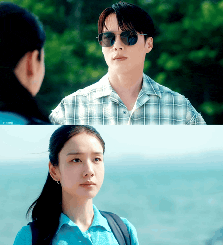 a man wearing sunglasses and a woman wearing a blue shirt are standing next to each other