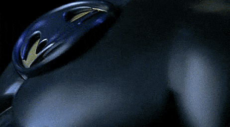 a close up of a blue object with a yellow arrow pointing to the left
