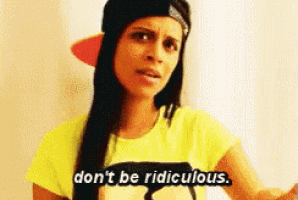 a woman wearing a hat and a yellow shirt says " don 't be ridiculous "