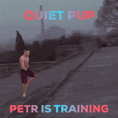 a shirtless man running on a street with the words quiet pup petr is training above him