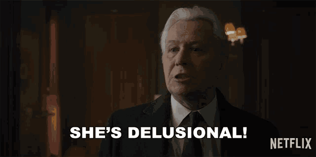 a man in a suit says she 's delusional