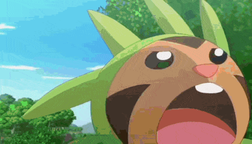 a close up of a cartoon character with its mouth wide open .