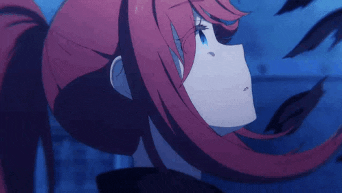 a girl with red hair and blue eyes is looking up at something