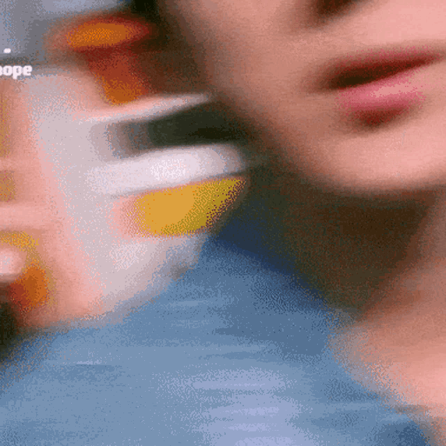 a blurry picture of a person 's face with the word hope visible
